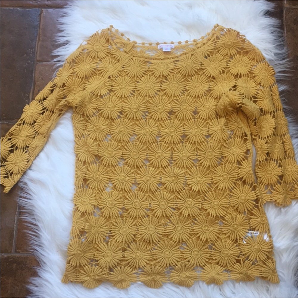 Yellow crocheted daisy shirt